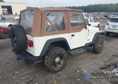 1999 Jeep Wrangler Sport z USA, uszkodzony, nr VIN 1J4FY19S1XP413327